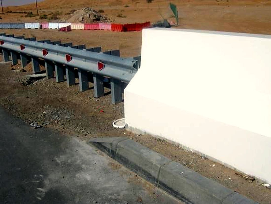 Road guard rail and concrete barrier installation